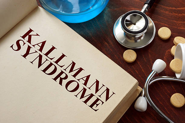 istock Kallmann syndrome written on book with tablets. 499690136