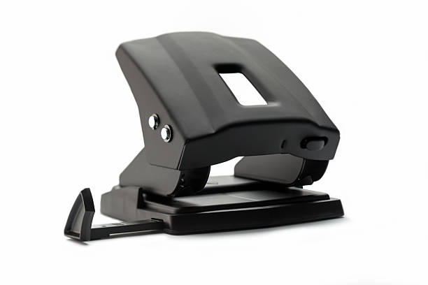 istock one black hole puncher isolated on white background 499691160