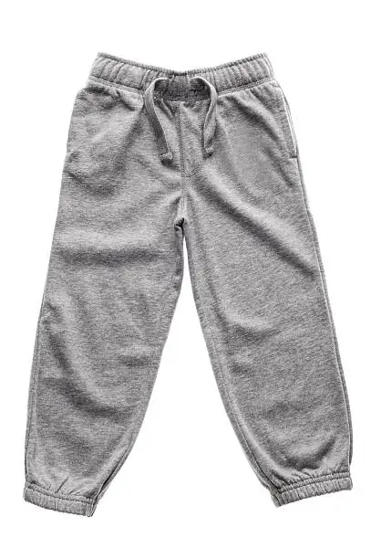 Gray children's sweatpants with ties isolated on the white