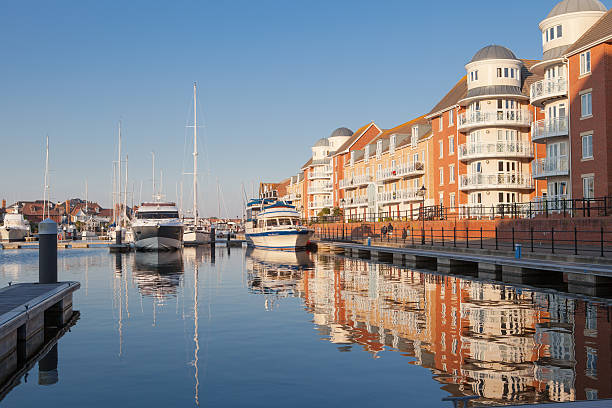 The yachts in Sovereign harbour, Eastbourne in the evening light Eastbourne, England - October 2, 2015: The yachts in Sovereign harbour in the evening light in Eastbourne, East Sussex, Enlgand eastbourne pier photos stock pictures, royalty-free photos & images