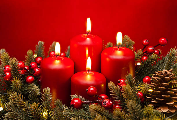 istock 4th Advent red candle flower arrangement 499693331