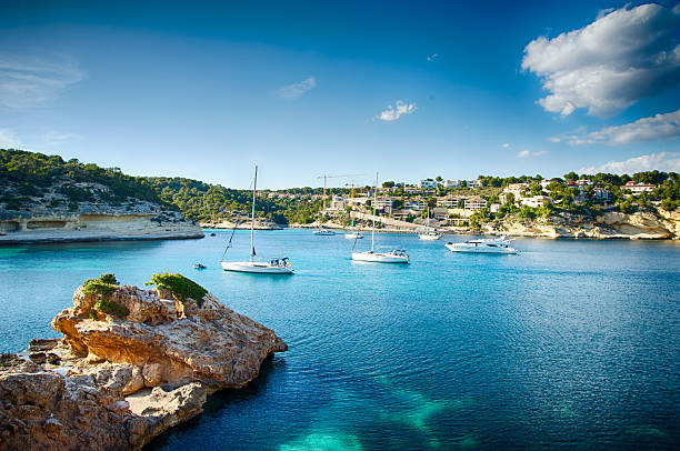 istock Boats and blue sea 499693887