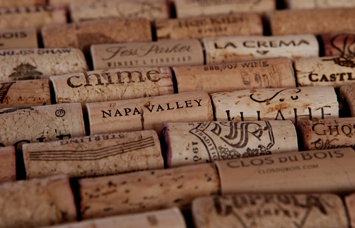 An assortment of wine corks from various wineries, mostly in California.
