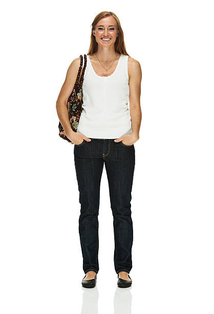 istock Happy young woman standing with purse 499694705
