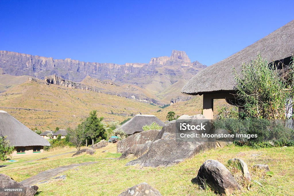 The Amphitheatre in Royal Natal National Park, South Africa Campsite with chalets in the Royal Natal National Park Africa Stock Photo