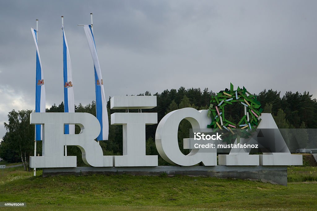 Riga with capital letters The photo of the "RIGA" at the entrance from A2 road to Riga city. Alphabet Stock Photo