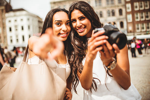 istock tourist using the camera outdoors 499695215