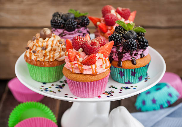 istock Set of different delicious cupcakes 499695238
