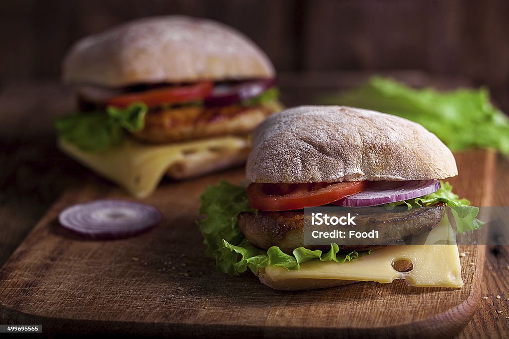 Italian ciabatta sandwiches with chicken, cheese and tomato Bread Stock Photo