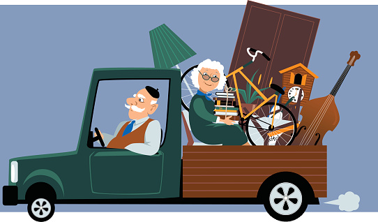 Senior couple in a pick-up truck moving their belongings, EPS 8 vector illustration, no transparencies