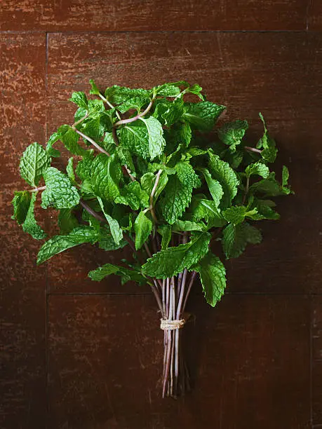 Bunch of mint on wooden table