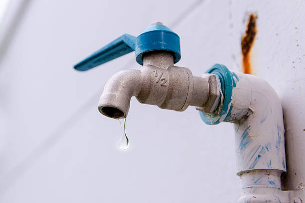 istock Tab water valve and white wall 499696915