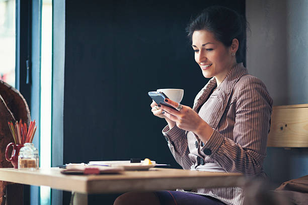 Young businesswoman having a coffee break