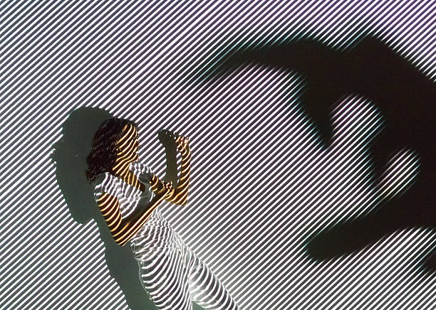 Woman being scared of hand shadowhttp://www.twodozendesign.info/i/1.png