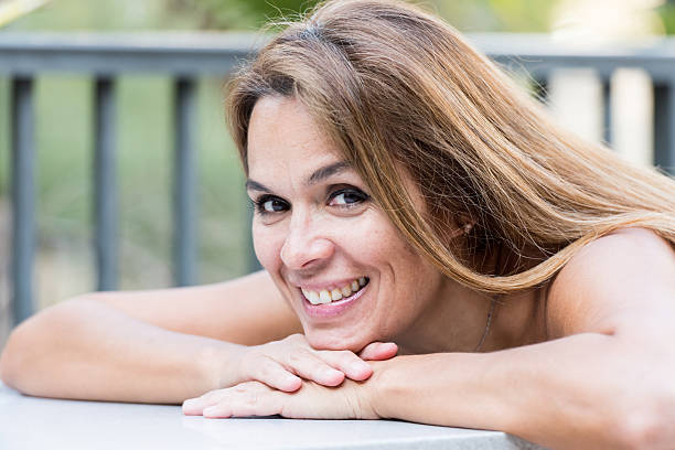 istock Smiling mature woman 499716704