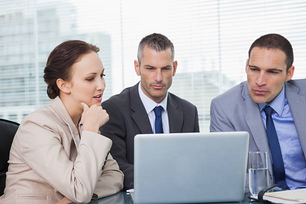 istock Colleagues working together on their laptop 499717005