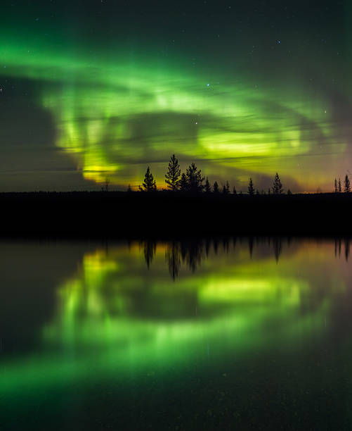 istock beautiful green and red aurora dancing 499717224