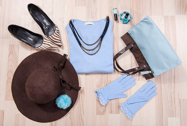 istock Winter sweater and accessories arranged on the floor. 499717966
