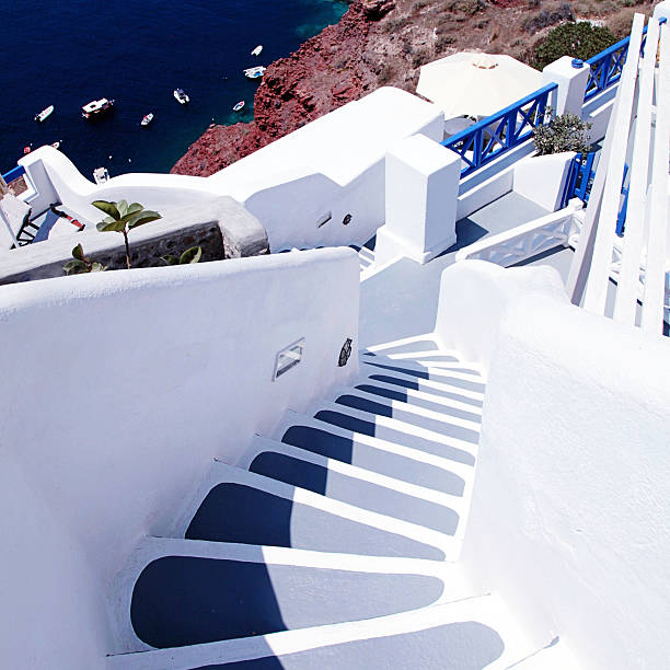 istock grey and white steps and Aegean sea in Oia, Santorini 499718050