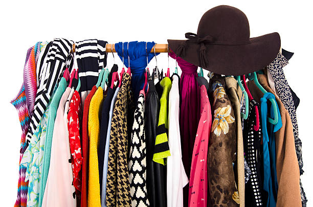 istock Closeup on clothes and hat on hangers in a store. 499718146