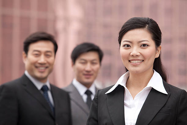 istock Three businesspeople outdoors 499718625