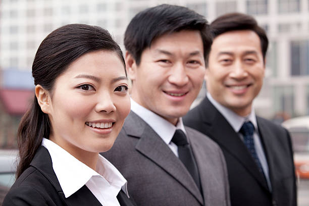 istock Three businesspeople outdoors 499718631