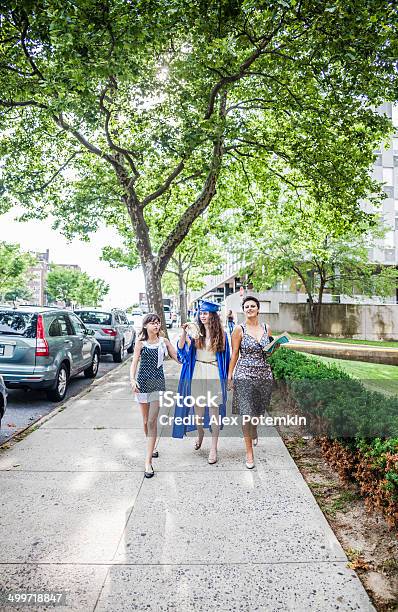 Gratuated Student Girl Walks At The Street Stock Photo - Download Image Now - Teenager, University, Achievement