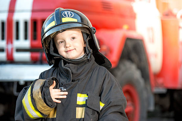 istock Little firefighter after of good work 499719981