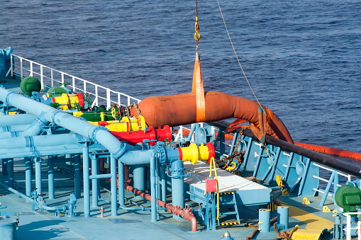 Big crude oil tanker loading from FPSO at the offshore terminal.