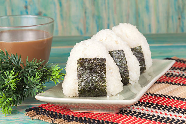 istock Rice ball,onigiri ,rice mixing with seaweed. 499720502