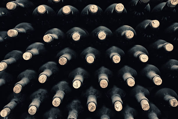 Stacked up wine bottles stock photo