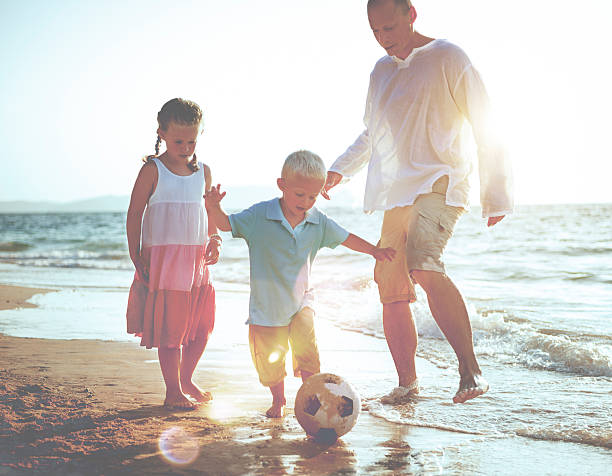istock Father Daughter Son Beach Fun Summer Concept 499721674