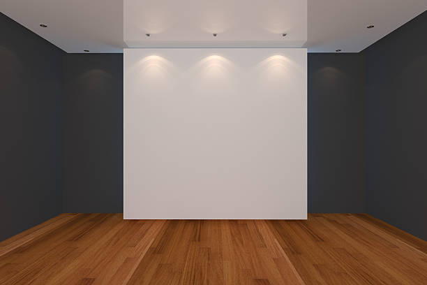 istock empty room black wall and wood floor 499722249