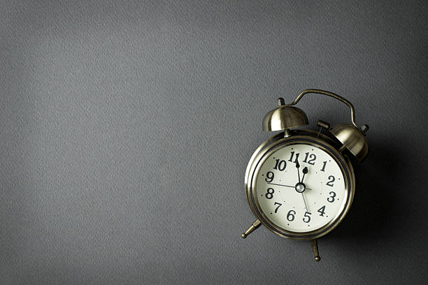 istock Alarm clock showing almost 12 o clock 499724212