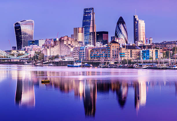 istock Downtown London City Skyline Reflection in River Thames at Night 499732346