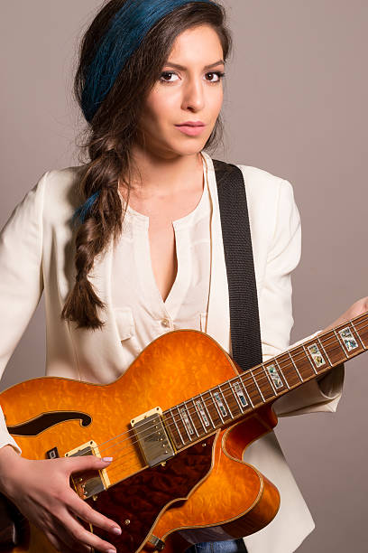 istock Woman with guitar 499734529