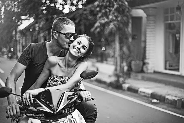 couple riding motorcycle
