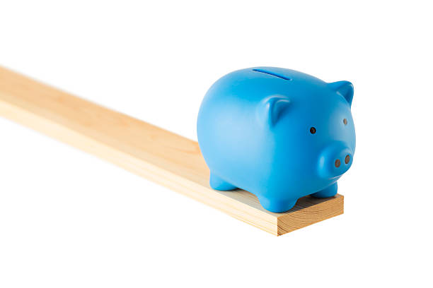 istock Piggy Bank walking the plank 499736223