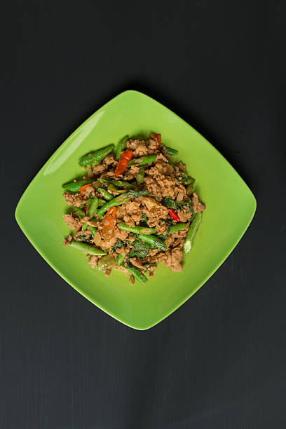 istock Fried Stir Basil with Minced pork on black background 499738676