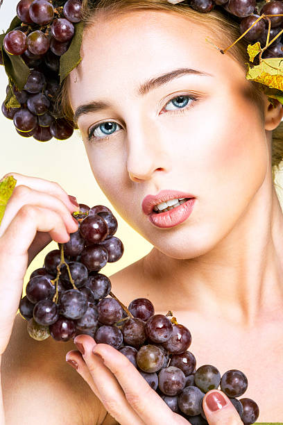 istock Woman with grapes 499741518