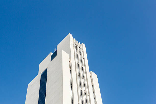 istock Top of building with clear sky in background. 499741824