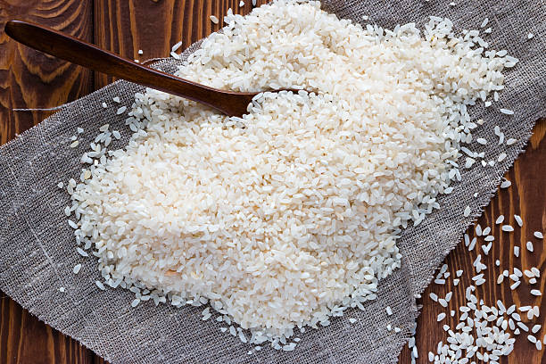 istock scattered rice on a napkin with a wooden spoon 499742552