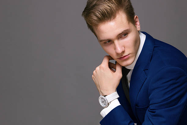 istock business man in suit with clock 499744194