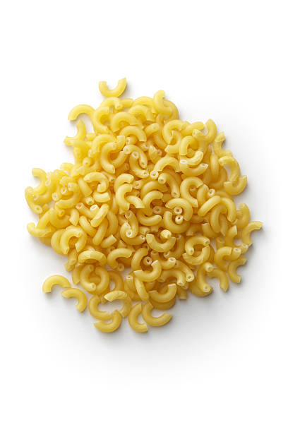ingredienti italiani: maccheroni - italian cuisine dry pasta directly above foto e immagini stock