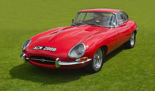 Saffron Walden, Essex, England - June 21, 2015: Classic Red E - Type Jaguar sports car  in vintage car Show.