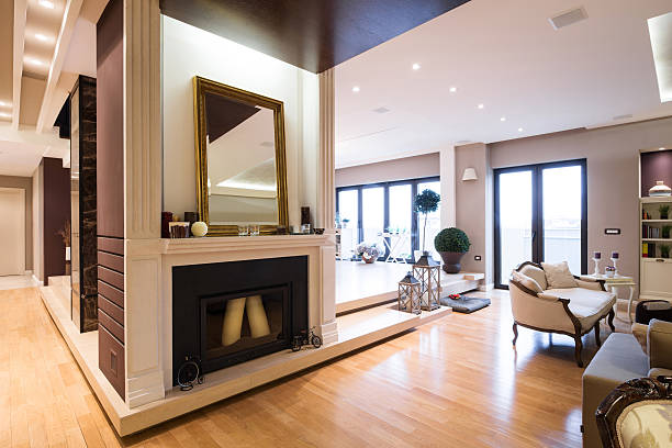 istock Fireplace, filed with candles, in luxury apartment 499749366
