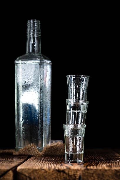 istock Pile of empty shot glasses 499749742