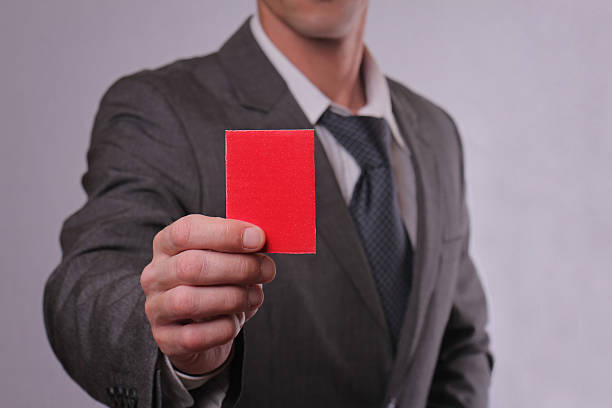 istock Businessman showing red card. 499753166