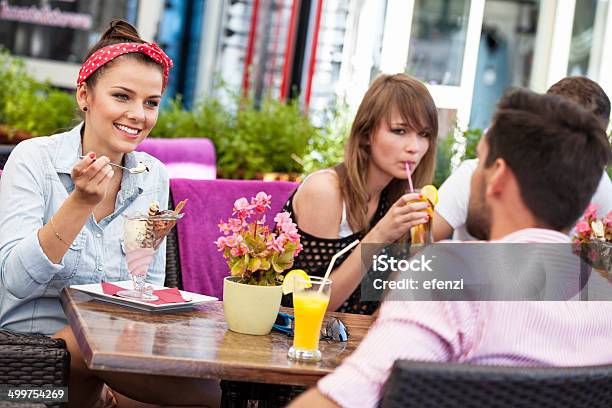 Young Woman Eating Ice Cream Stock Photo - Download Image Now - Adult, Adults Only, Bowl