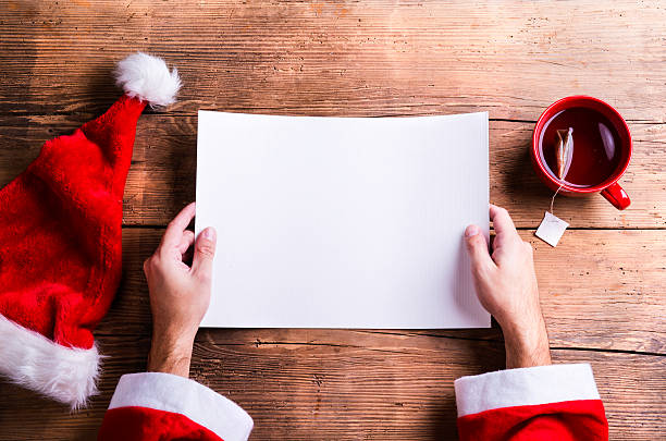 istock Santa Claus and wishlist 499754472